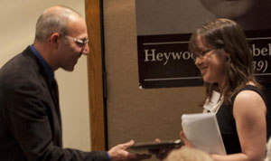 Photo: Meagan Gillmore is presented with Barr Award at ceremony in Washington